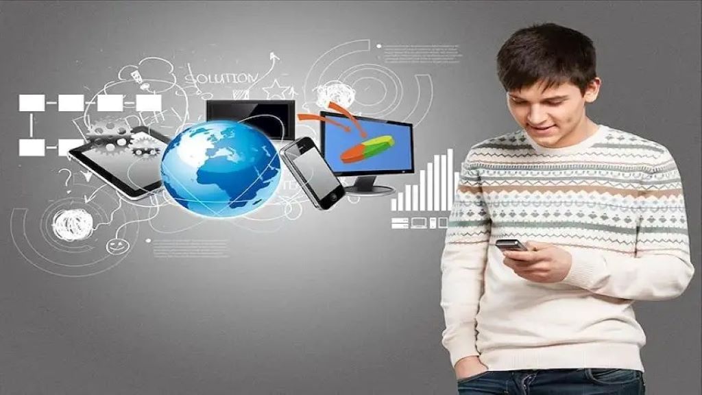 Person reading daily technology news on a smartphone and laptop
